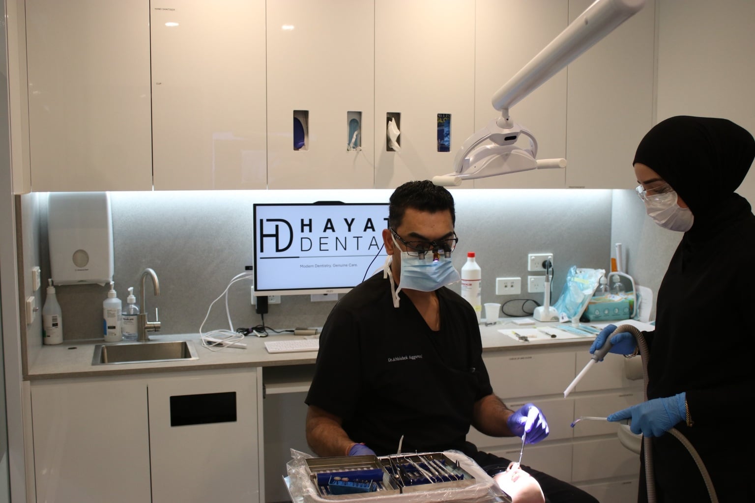 Dr Abhishek Aggarwal treating a patient at Hayat Dental