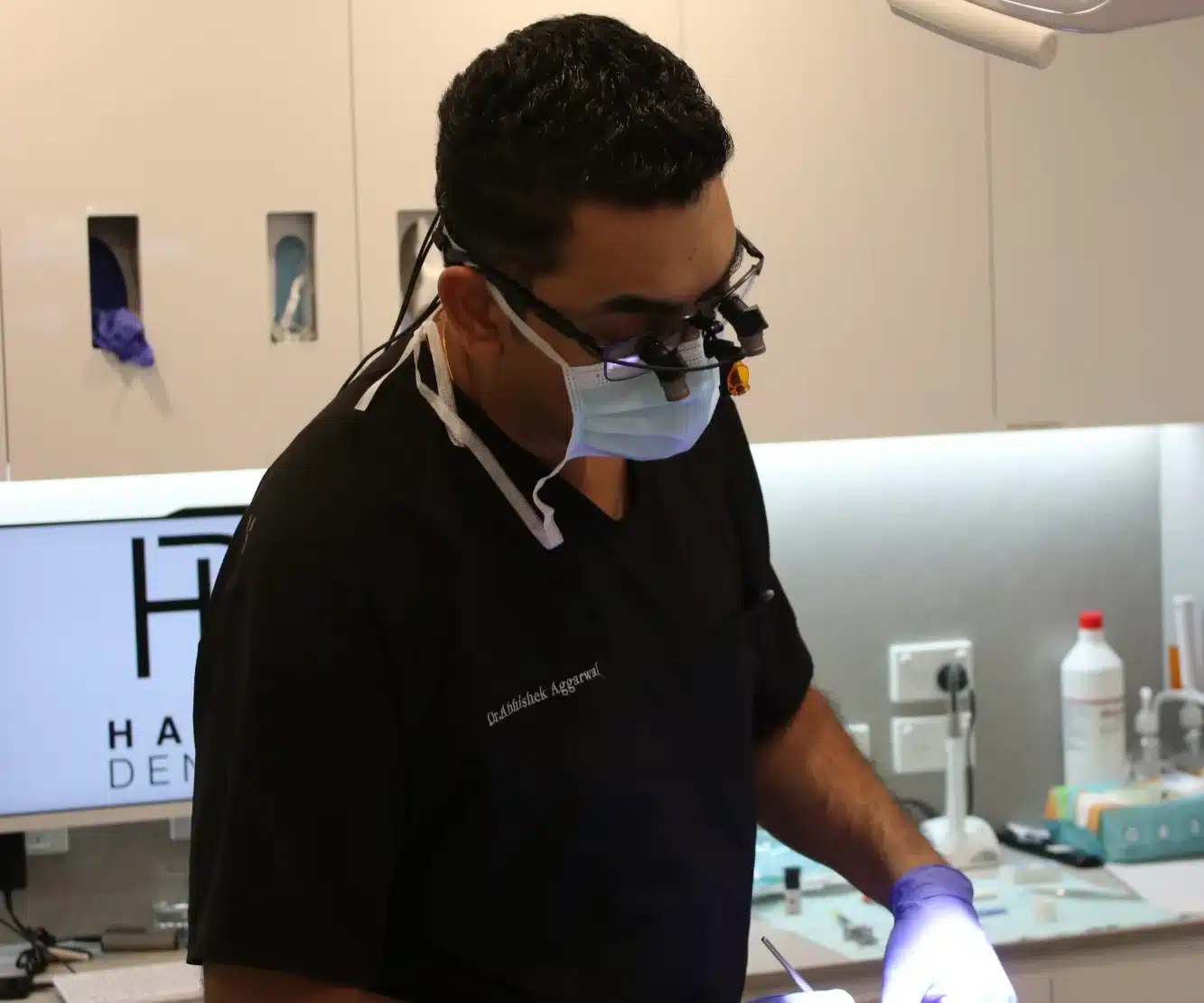Dr Abhishek Aggarwal examining a patient at Hayat Dental