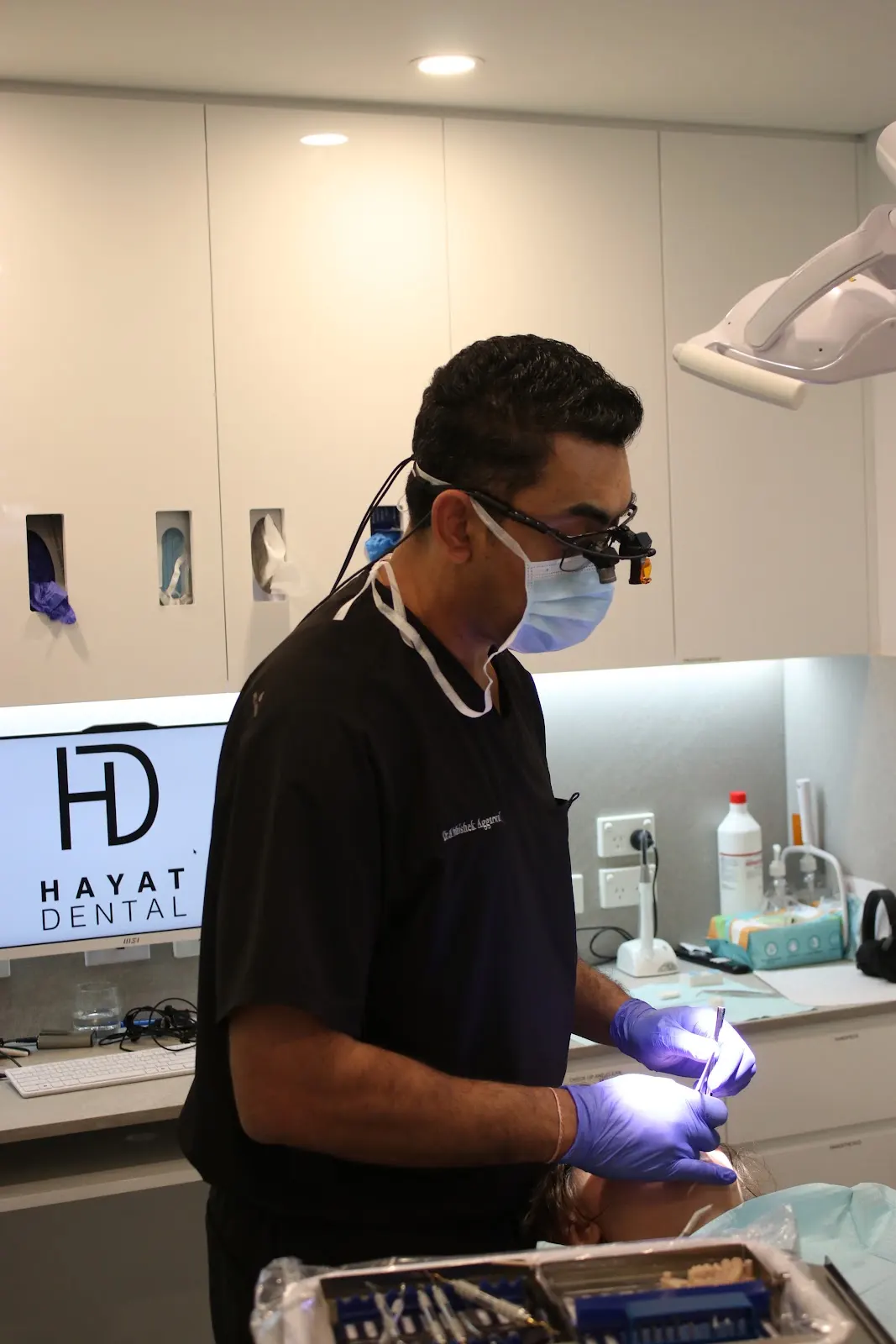 A Hayat Dental dentist treating a patient