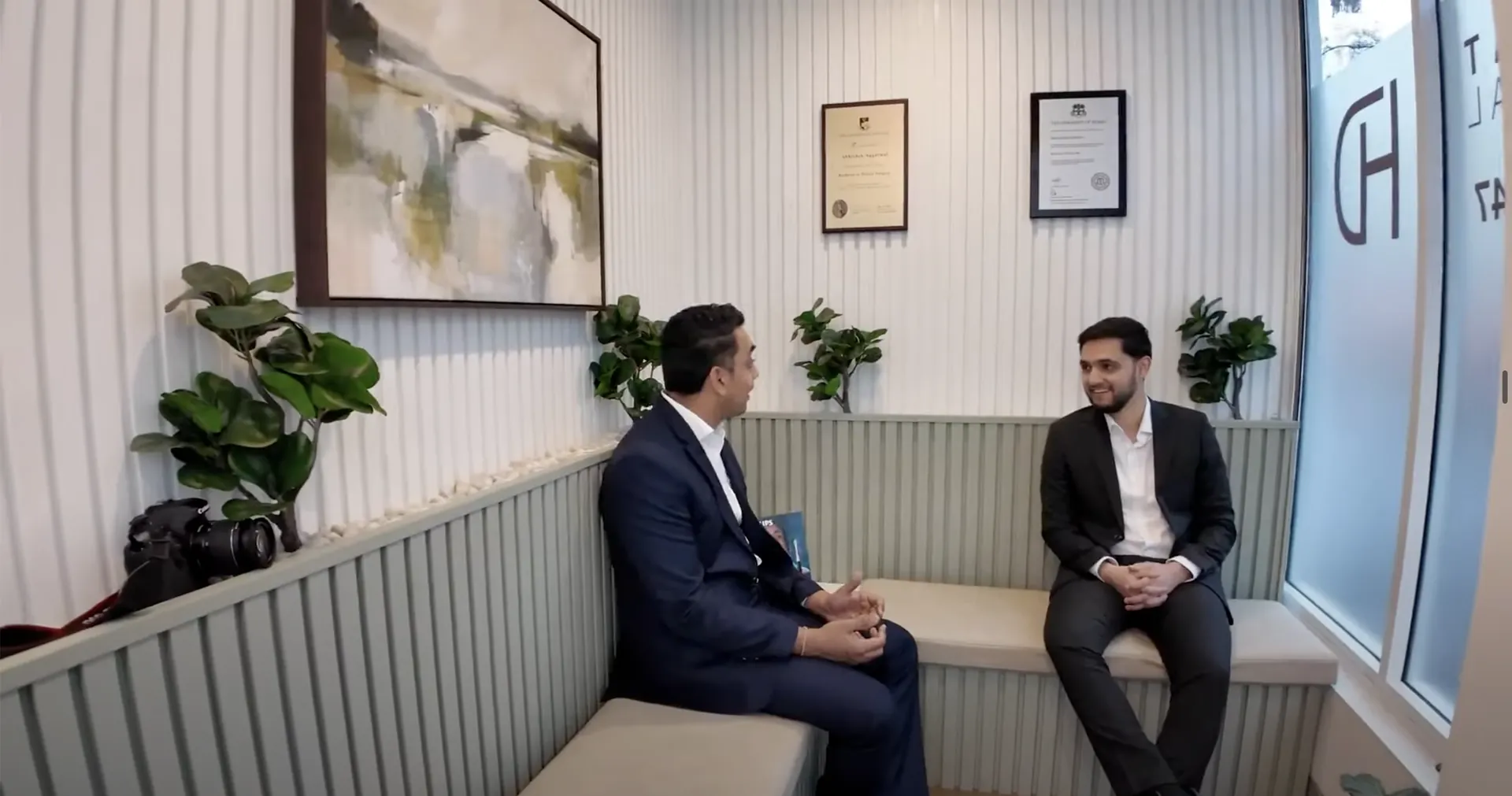 A relaxed conversation in the Hayat Dental waiting area